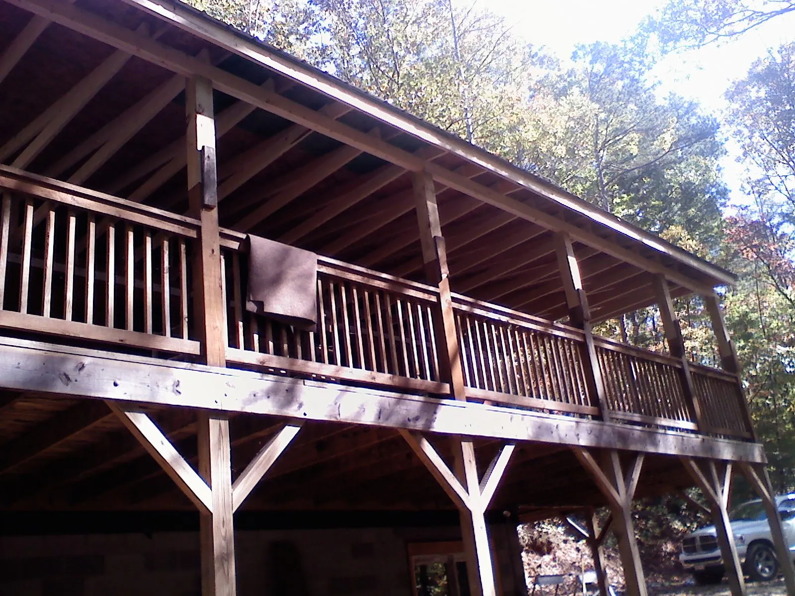 Timber framing under a new elevated porch and deck — Roof Leak Repair in Townsend by Roofing Brothers